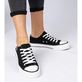 Zapatillas clásicas negras de mujer. negro 1