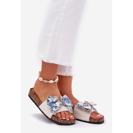 Zapatillas para mujeres con un arco en la plataforma de corcho azul beige 1