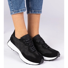 Zapatillas deportivas de mujer negras. negro 2