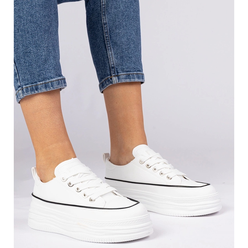 Zapatillas de deporte de mujeres blancas en una suela alta blanco 1