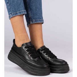 Zapatillas de deporte para mujeres negras en una suela alta negro 2
