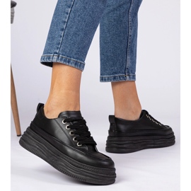 Zapatillas de deporte para mujeres negras en una suela alta negro 4