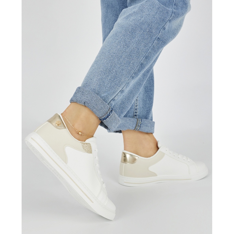 Calzado deportivo clásico de mujer. blanco 1