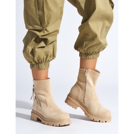 Botines de mujer beige con cremallera decorativa. 1