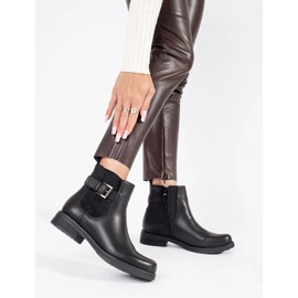 Botines de mujer negros con hebilla y tacón bajo. 1