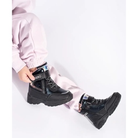 Zapatos de niña negros con suela gruesa. 4