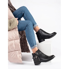 Botas Chelsea de mujer negras con tacón plano negro 4
