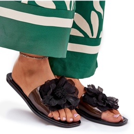 Chanclas de mujeres planas transparentes con flores artificiales negros 8