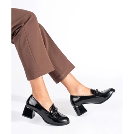 Zapatos negros de tacón para mujer. 4