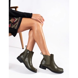 Botas Chelsea de mujer verdes con tacón bajo. 1