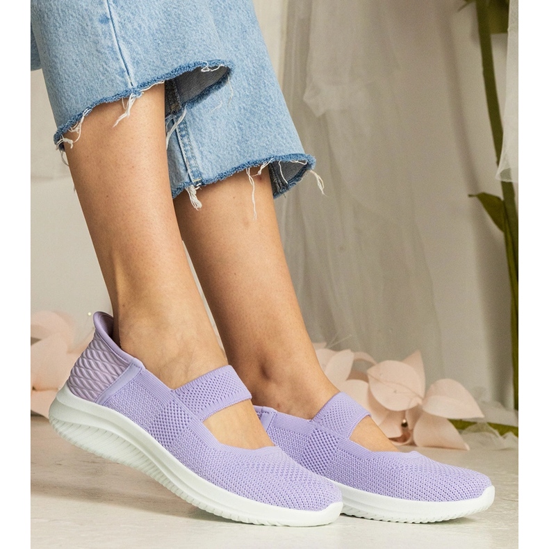 Zapatillas violetas para mujeres en una suela prensada púrpura 2