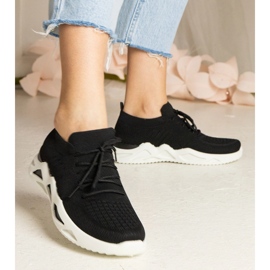 Zapatillas de deporte de mujeres negras con una parte superior de SOCKING negro 5