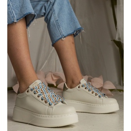 Zapatillas beige para mujeres con cordones masivos 1