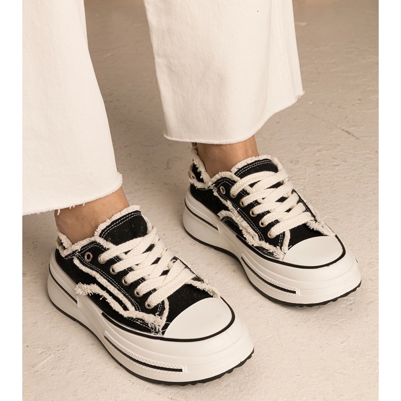 Zapatillas de deporte para mujeres negras en una suela alta negro 1