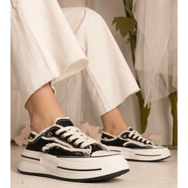 Zapatillas de deporte para mujeres negras en una suela alta negro 3