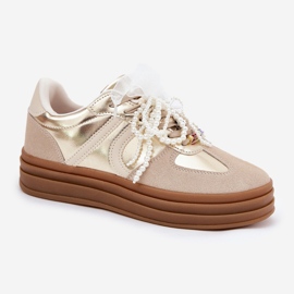 Zapatillas de deporte para mujeres en la plataforma con decoraciones beige-oro 4