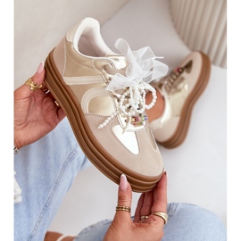 Zapatillas de deporte para mujeres en la plataforma con decoraciones beige-oro 9