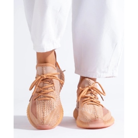 Zapatillas textiles en la plataforma naranja 1