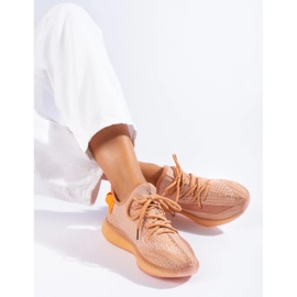 Zapatillas textiles en la plataforma naranja 3