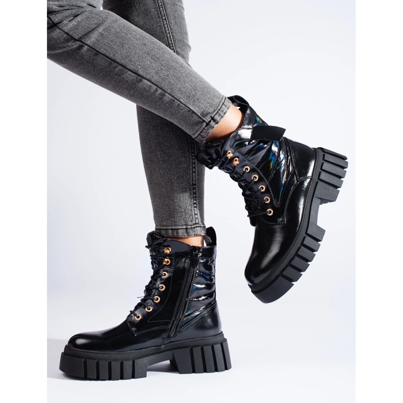 Zapatos obreros de mujer negros con suela gruesa. 1