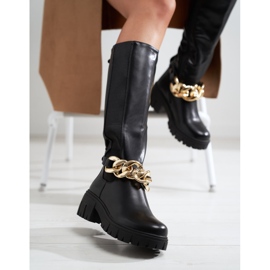 Botas de mujer negras con suela gruesa fabricadas en piel ecológica. negro 3