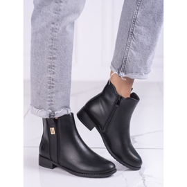 Elegantes botas Chelsea de mujer con tacón plano. negro 3