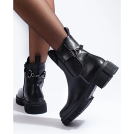 Botas negras de mujer en la plataforma. negro 4