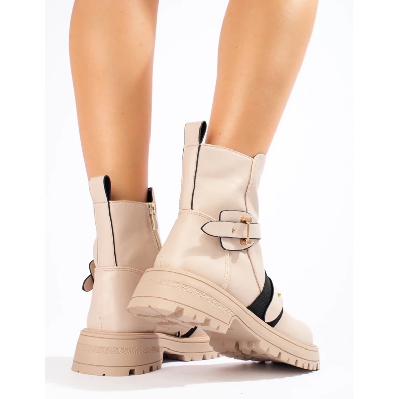 Bolsos de mujer beige con protector. 1