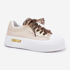 Zapatillas para mujeres en una plataforma masiva con beige decorativo de cordones 3
