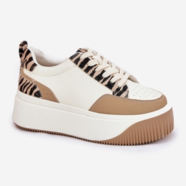 Zapatillas femeninas en una plataforma masiva beige cebra 4