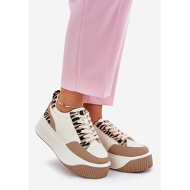 Zapatillas femeninas en una plataforma masiva beige cebra 1
