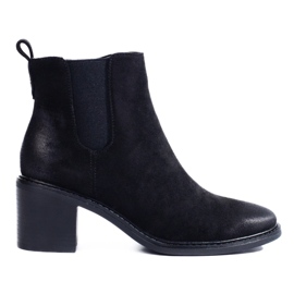 Botines Chelsea negros de mujer en el poste 3