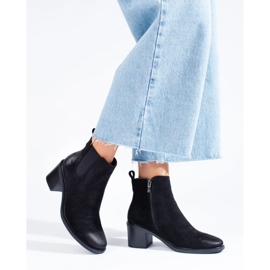 Botines Chelsea negros de mujer en el poste 2