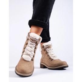 Botas de piel de oveja beige para mujer. 4