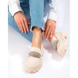 Zapatos de mujer fabricados en ecopiel beige. 4