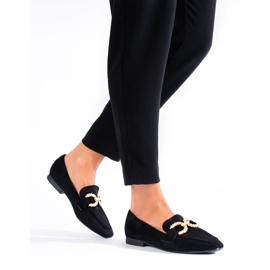 Mocasines negros de mujer con decoración. 4