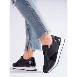 Zapatillas deportivas mujer Shelvt de piel color negro. 3