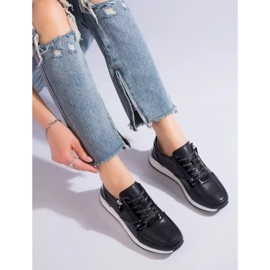 Zapatillas deportivas mujer Shelvt de piel color negro. 4