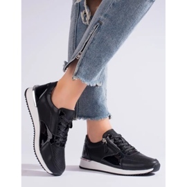 Zapatillas deportivas mujer Shelvt de piel color negro. 1