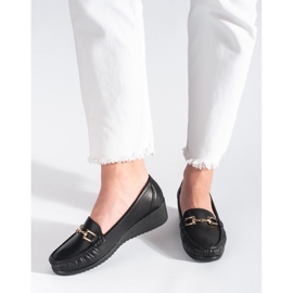 Mocasines de mujer negros con hebilla. 1