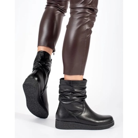 Botines de mujer de piel negra con cuña baja y parte superior con volantes de Sergio Leone negro 5