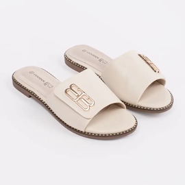 Goodin Light -Beige Femen's Flaps en una suela plana con un adorno 1