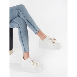 Zapatillas blancas con adiciones doradas blanco 2