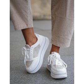 Zapatillas de deporte para mujeres con un patrón blanco 12