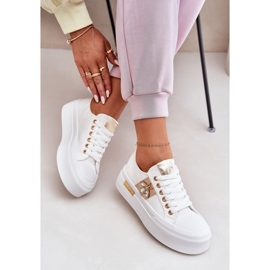 Zapatillas de deporte para mujeres en la plataforma con un detalle decorativo blanco 7