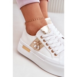 Zapatillas de deporte para mujeres en la plataforma con un detalle decorativo blanco 8