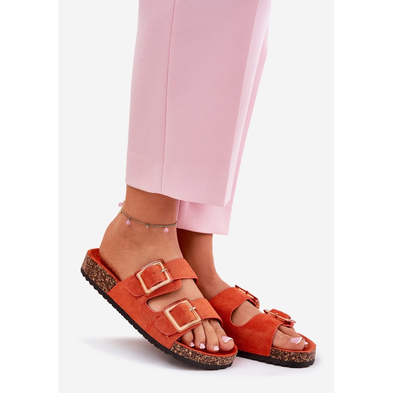 Chanclas para mujeres con abrazaderas en una suela de color naranja de corcho 1