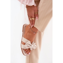 Chanclas planas para mujeres con beige de arco 6