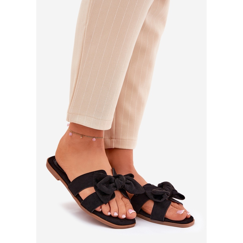 Chanclas de mujeres planas con arco negro 1