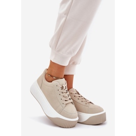Zapatillas de deporte en una plataforma masiva beige suave 1